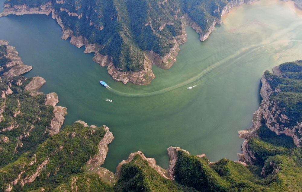 建设美丽中国 护绿水青山“金饭碗”